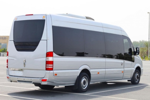 Mercedes Sprinter 22 Seater rental with side lift for easy luggage loading in UAE.
