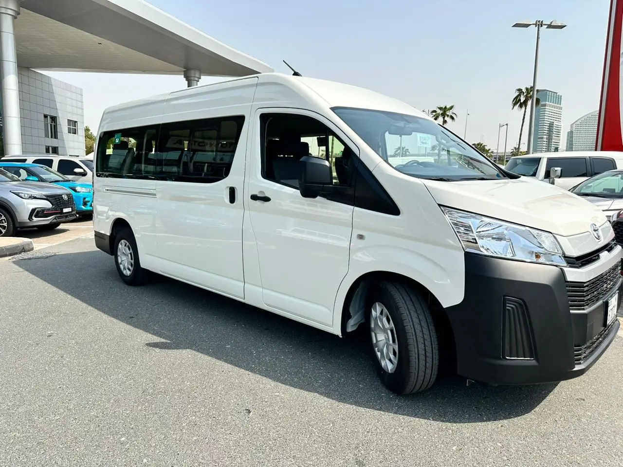 Spacious Cargo Access:
Toyota HiAce Van Wide Sliding Door (Right Side).