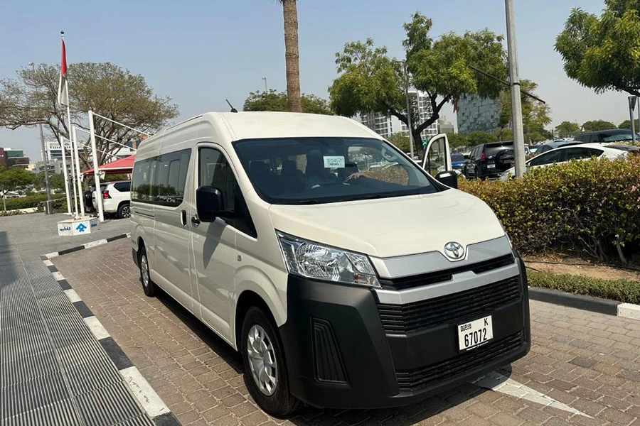 Easy Passenger Entry:
Wide Sliding Door on Toyota Minibus (Right Side)